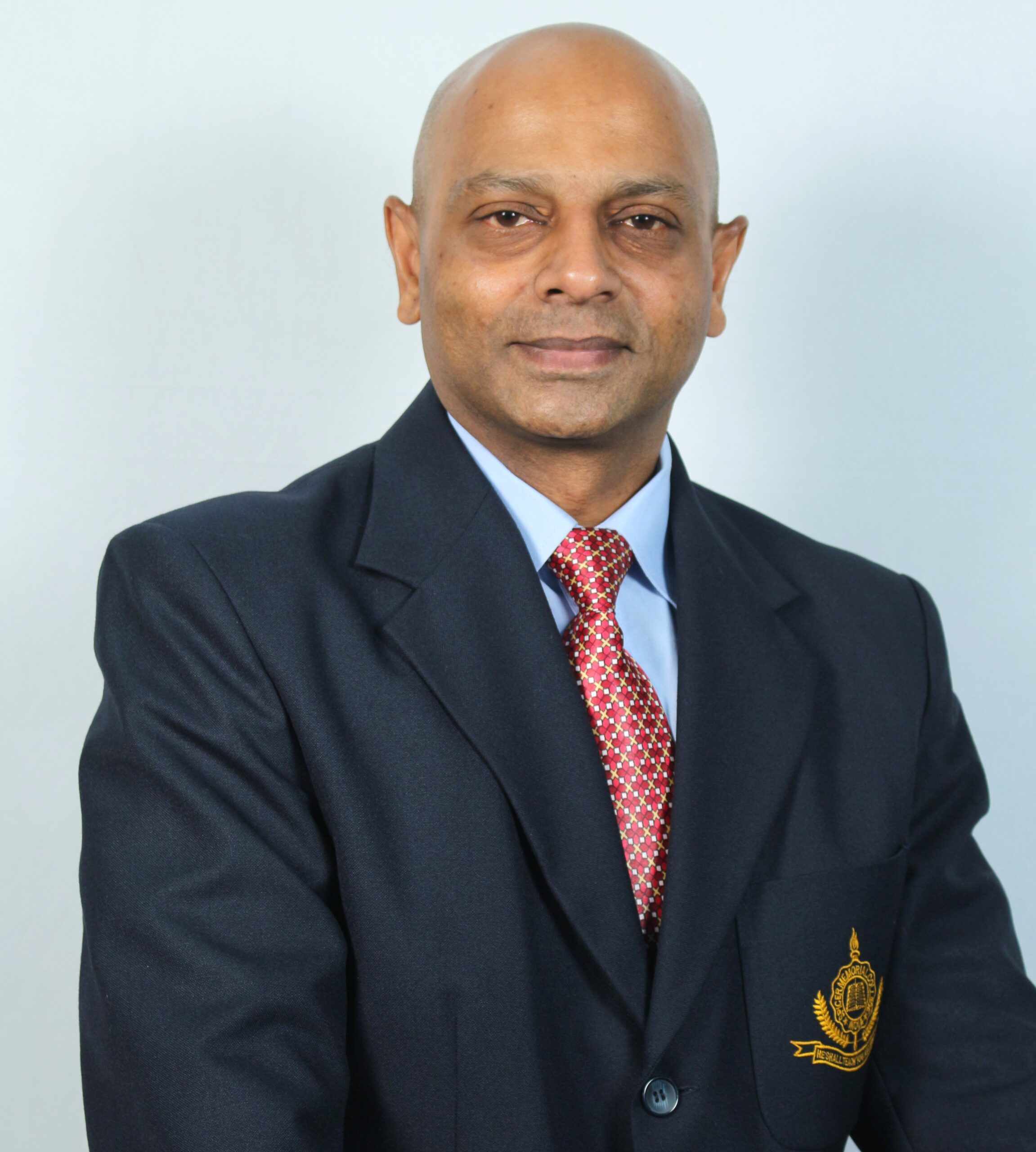 Dr. Genu Roney Varghese